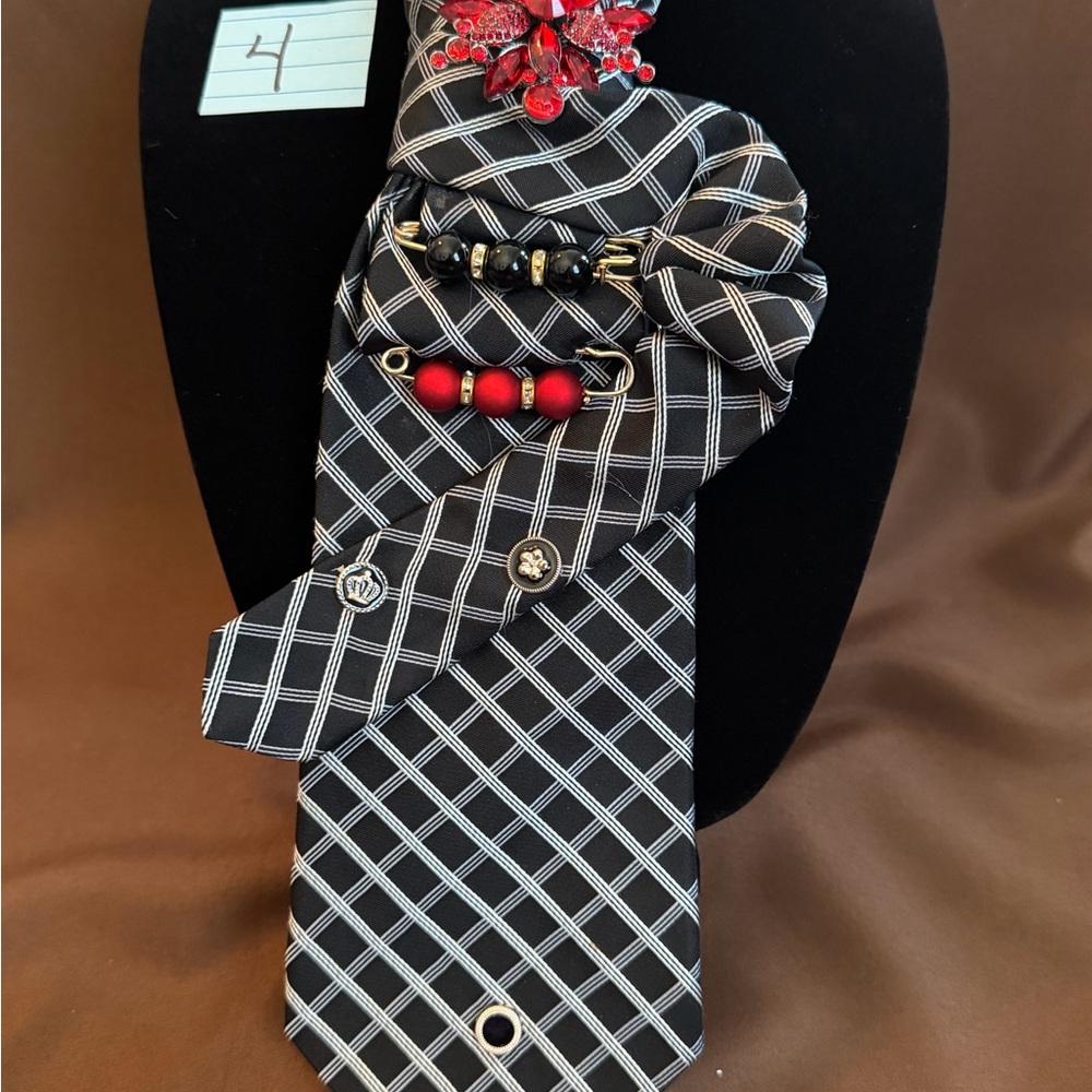 Black & White Checked Necktie with Red Accent Pins